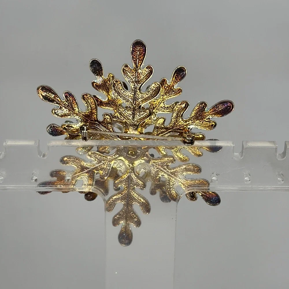 Chic Snowflake Brooch with Blue Highlights